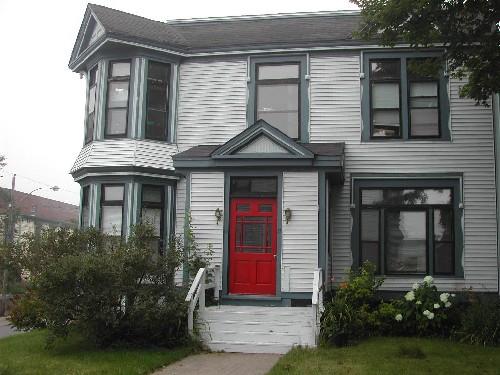 This photograph shows the Pagan Place façade, 2005; City of Saint John