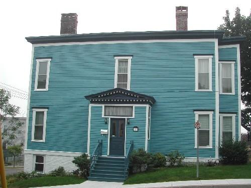 This photograph shows the Pagan Place façade, 2005; City of Saint John