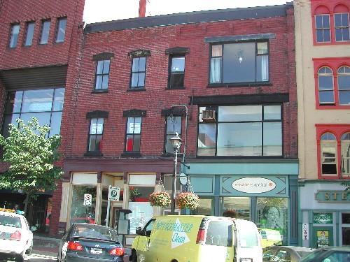 This photograph shows the contextual view of the building, 2005; City of Saint John