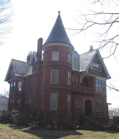 Of note are the gabled roofs and the dormer on third floor.; Lindsay Benjamin, 2007
