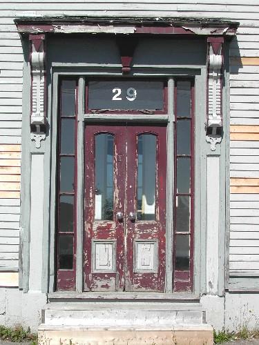 This photograph shows the main entrance to the building, 2005; City of Saint John