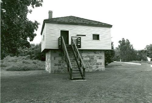 General view of the Blockhouse, showing its simple design and materials, 1989.; Department of Public Works / Ministère des Travaux publics, 1989.