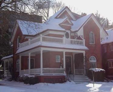 Featured is the varied and punctuated roofline including gable with large brackets, 2007.; Lindsay Benjamin, 2007.