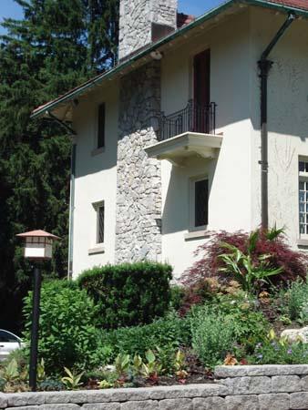 Of note is the wrought iron balcony at the main house of the Elsie Perrin Williams Estate.; Kendra Green, 2007.