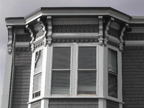 This photograph shows the ornate cornice at the top of one of the bay windows, 2005; City of Saint John