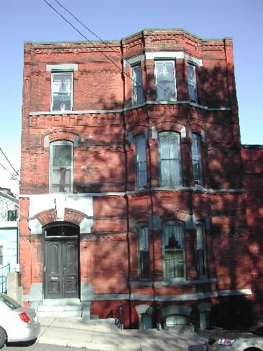 This photograph shows the contextual view of the building, 2005; City of Saint John