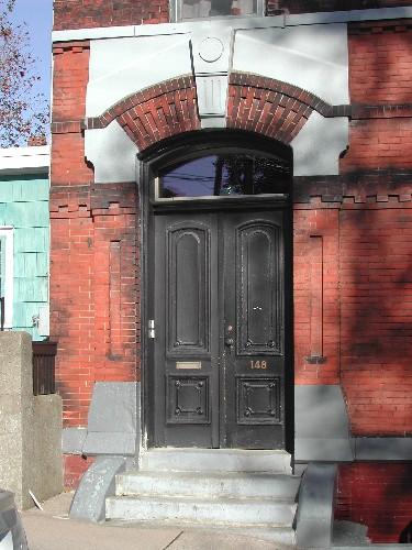 This photograph shows the segmented arch entranceway, 2005; City of Saint John