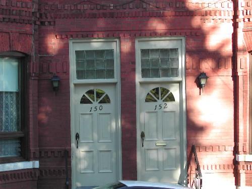 This photograph shows the two entrances to the two-family complex, 2005; City of Saint John