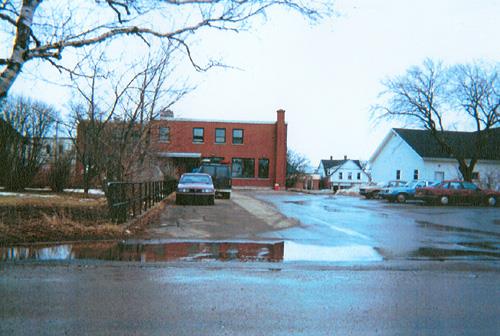 View of the exterior of the Government of Canada Building, showing the red brick masonry, 1996.; Parks Canada Agency / Agence Parcs Canada, 1996.