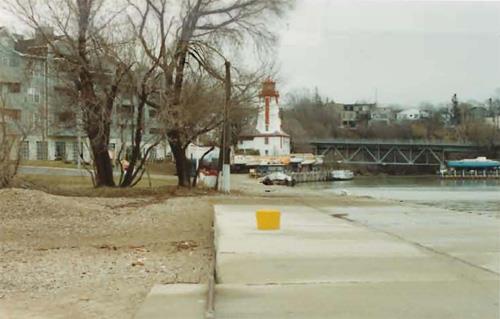 View of the Tower in the distance, showing the unified form and picturesque stepped profile of the tower and dwelling, 1990.; Transport Canada / Transports Canada, 1990.