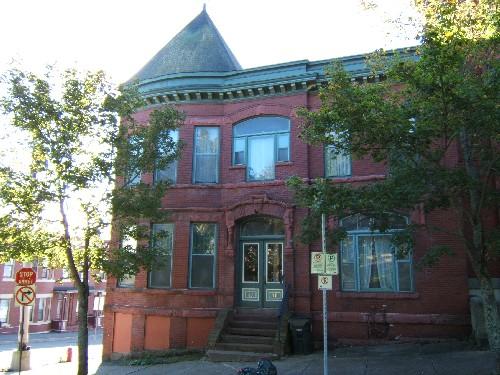 This photograph shows the contextual view of the building, 2005; City of Saint John