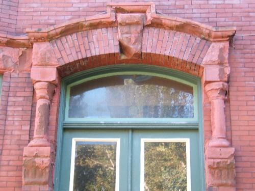 This photograph shows the entablature over small columns and pilasters, 2005; City of Saint John