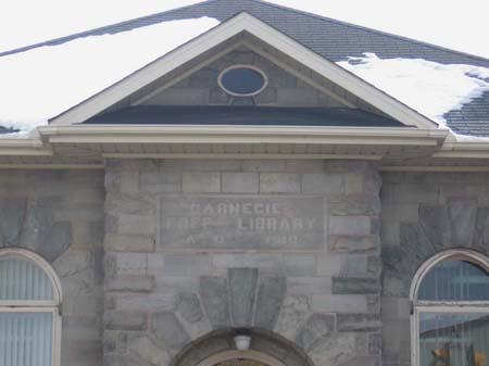 The inscription in the front gable references this library's history as a Carnegie Library, 2007.; Lindsay Benjamin, 2007.