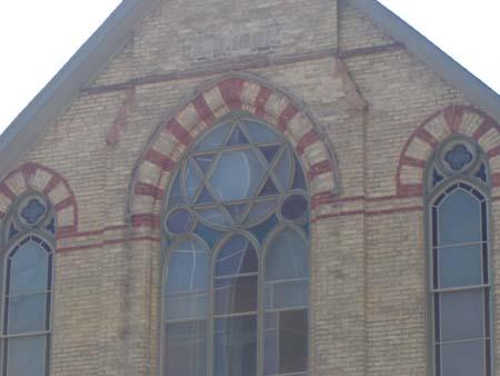 Of note is the Star of David which appears in the original window.; Kendra Green, 2007.