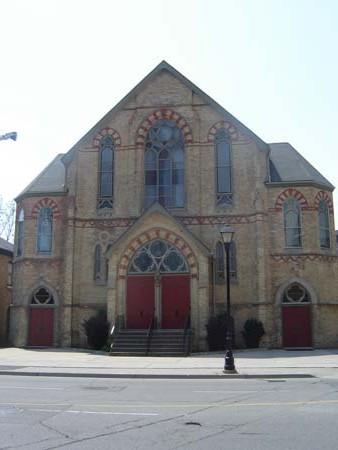 Of note are the polygonal stair towers, the buff-brick and the decorative dichromatic brickwork.; Kendra Green, 2007.
