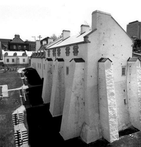 General view of the Dauphine Redoubt, showing the east façade and north wall after restoration, 1983.; Agence Parcs Canada (Région de Québec) / Parks Canada Agency (Québec Region), 101/07/PR-6/S1505/#10, 1983.