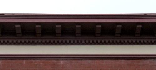 This image provides a view of the large cornice ornamented by dentils and modillions, 2005; City of Saint John