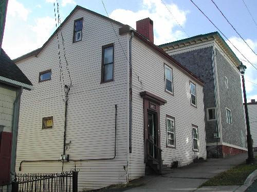 This photograph shows the contextual view of the building, 2005; City of Saint John