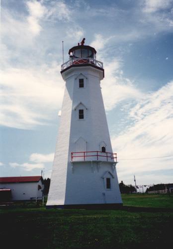 General view of the Tower, showing the fog detection balcony with red-painted steel guardrail, 1990.; Transport Canada / Transports Canada, 1990.