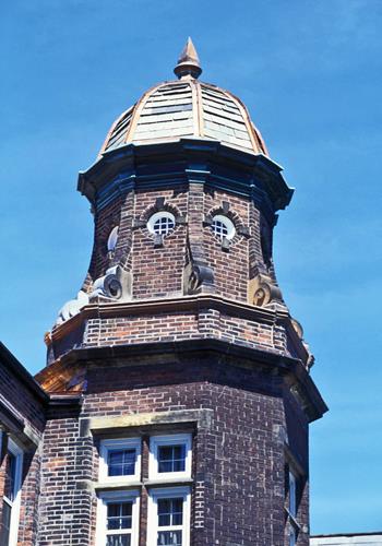 Detail view of Annesley Hall, showing the steeply pitched roof punctuated by prominent Flemish gables and dormers, 1994.; Parks Canada Agency / Agence Parcs Canada, J Butterill, 1994.