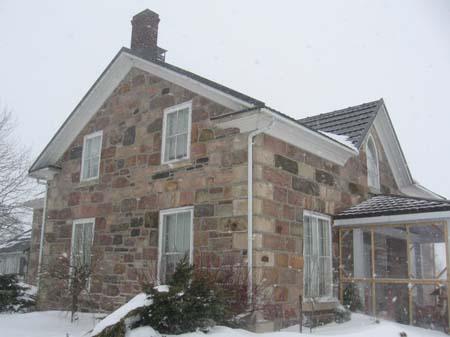 West elevation depicting the large quoining and 6/6 double-hung windows, 2007.; Lindsay Benjamin, 2007.