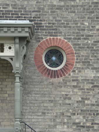 Featured is a circular stained glass window.; Martina Braunstein, 2007.