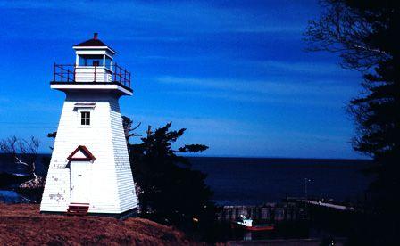 Front elevation of Hampton Lighthouse and view of Chute Bay, NS, 2002.; Hampton Lighthouse and Historical Society March 2002