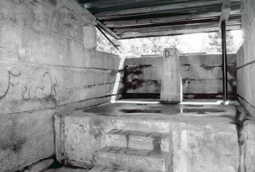 Interior view of the Range Finder Bunker, showing the simple, functional layout of the two interior spaces, 1995.; Parks Canada Agency / Agence Parcs Canada, I. Doull, 1995.