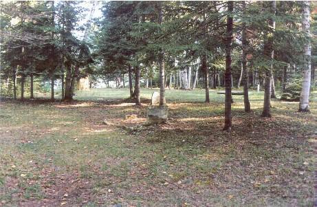View of Beaubears Island, showing the remnants of a cemetery, 1999.; Agence Parcs Canada / Parks Canada Agency, Ian Doull, 1999.