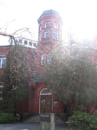 Featured is the octagonal central turret and arched entranceway.; Lindsay Benjamin, 2007.