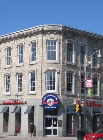 Featured are windows framed with pediment lintels.; Lindsay Benjamin, 2007.