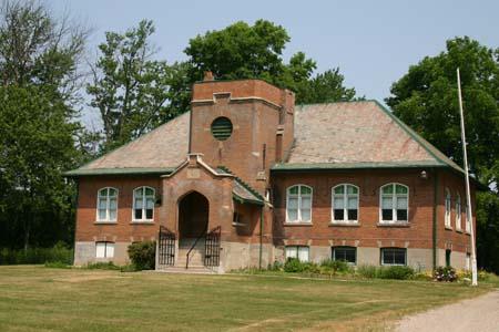 Featured is the symmetrical façade of the Museum School.; Ministry of Culture, 2007.