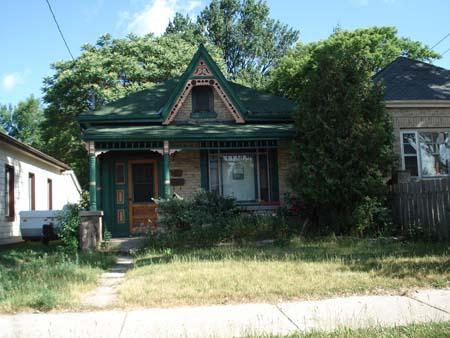 Featured is an Ontario Cottage residence located within the Old East Heritage Conservation District.; Kendra Green, 2007.
