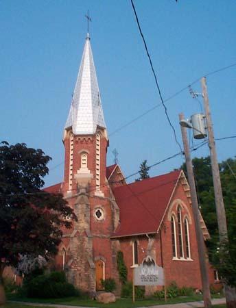 The photo features elaborate ornamentation which exemplified the rooftop cresting, circa 2004.; Township of Centre Wellington