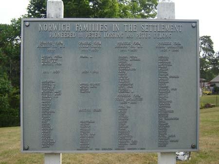Featured is the Norwich Pioneer Society Plaque, commemorating pioneer families in Norwich Township.; Martina Braunstein, 2007.