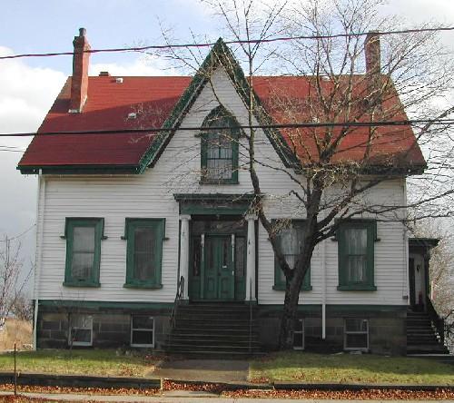 This photograph provides a contextual view of the building on Douglas Avenue, 2005; City of Saint John