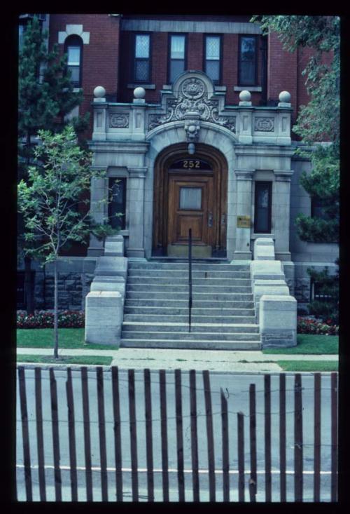 Front view of the John R. Booth Residence, showing the carved stone entrance, 1982.; Parks Canada Agency, Agence parcs Canada, 1982.