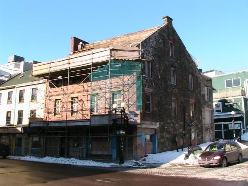 Exterior photo of Yellow Belly Corner, shown during restoration work, photo circa 2005.; HFNL 2006