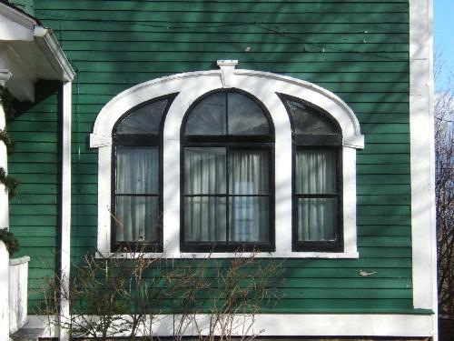 This photograph shows the ornate palladian window, 2006; City of Saint John