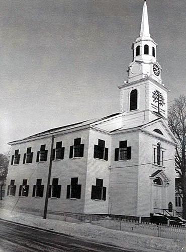View of the exterior of Greenock Church, showing the timber-frame construction and wood cladding, the rectangular massing under a pitched roof with the main entrance orientated on the short end, 1994.; Parks Canada Agency/Agence Parcs Canada, Katherine Spencer-Ross, 1994.
