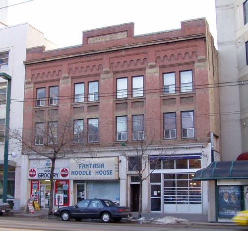 View of the principal front facade of the Jasper Block looking north from Jasper Avenue; City of Edmonton, Planning and Development Department, March 2003