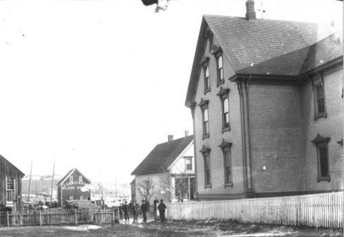 View of 680 Main Street, Ernst shops and wharves circa 1900 , Mahone Bay, NS.; Courtesy of Settlers Museum, Mahone Bay, NS