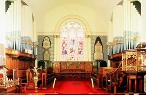 Interior view of St. Paul's Anglican Church, showing the altar and the simple, plastered interior finish, 1994.; Parks Canada Agency / Agence Parcs Canada, 1994.