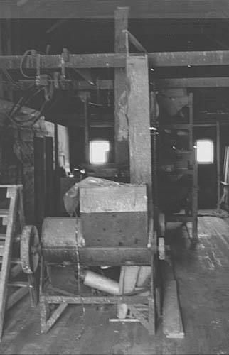 General view of seed cleaning machinery at Seager Wheeler's Maple Grove Farm, 1994.; Parks Canada Agency / Agence Parcs Canada, E. Mills, 1994.