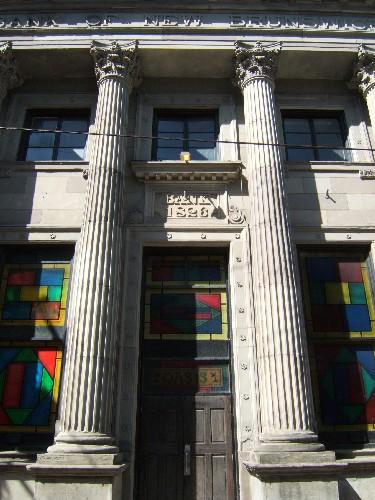 This photograph shows the entrance to the building and the tall fluted columns, 2005; City of Saint John