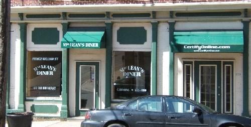 This photograph shows the southern storefront and the central entrance, 2005; City of Saint John