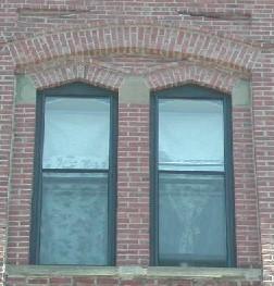 This photograph shows the paired windows with pointed arches, 2005; City of Saint John