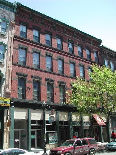 This photograph shows the contextual view of the building, 2005; City of Saint John