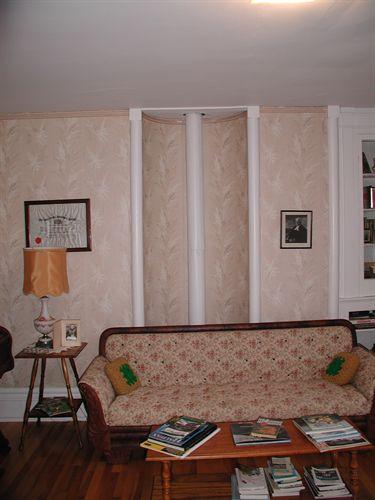 Stove alcove and front parlour, MacKeen-Smith House, Mabou, Nova Scotia, 2002.
; Inverness County Heritage Advisory Committe, 2002.