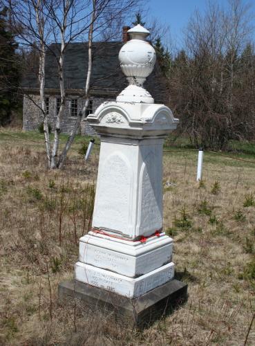 War Memorial with former school in background; Donna Collings, 2008